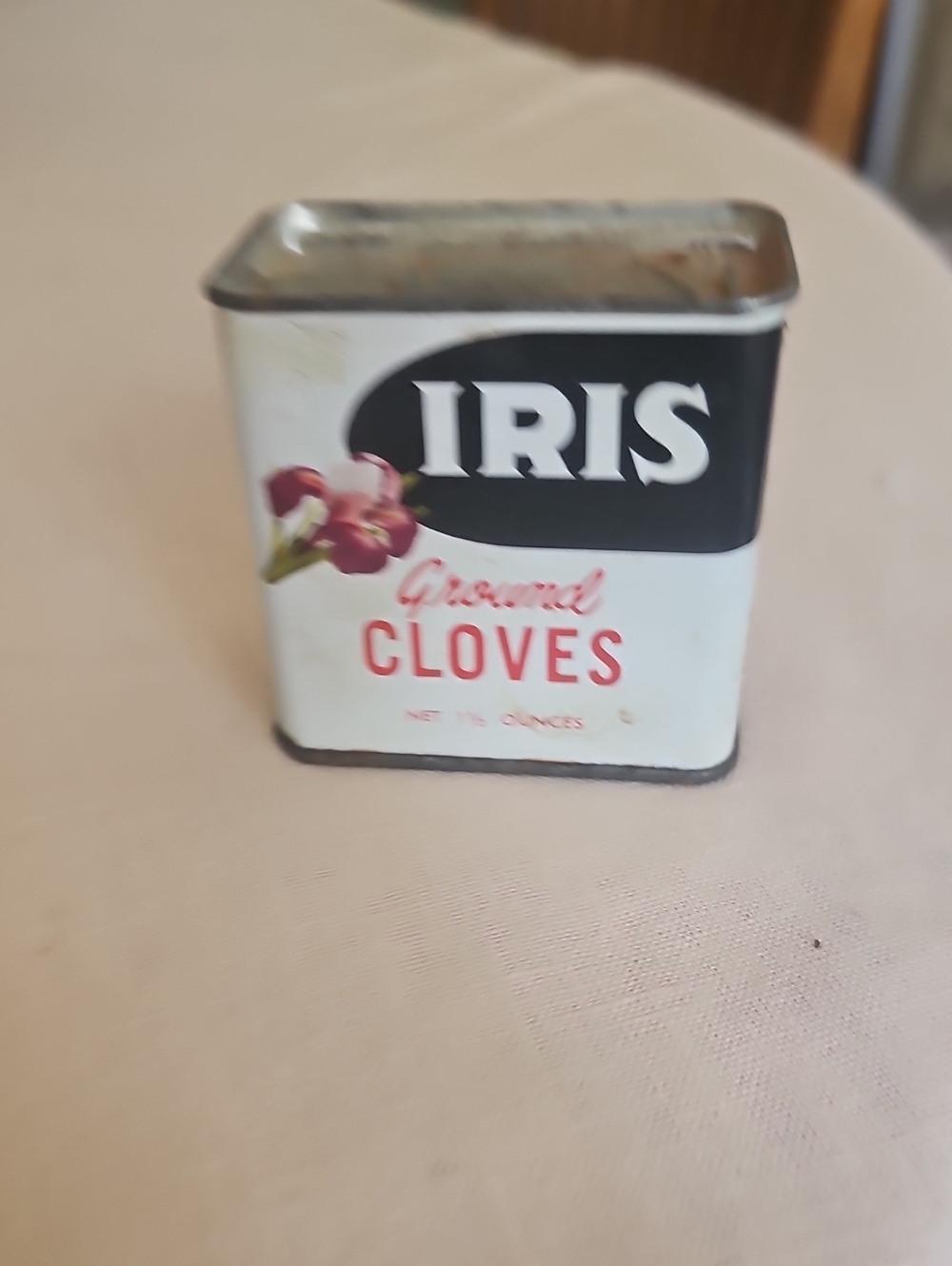 iris White Tin with Black Label and Red Accents
